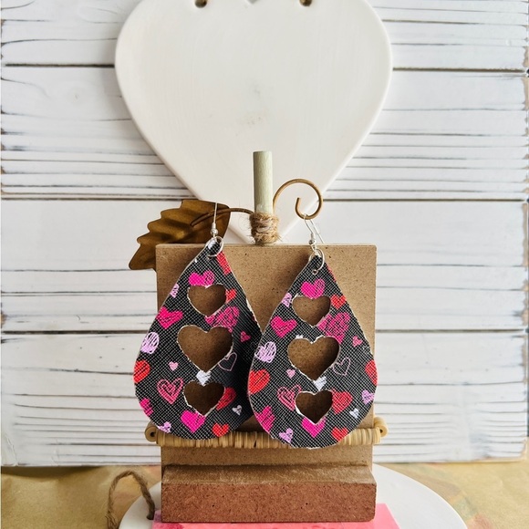โจ Spice up your Valentine's Day look with our fabulous Heart Faux Leather Earrin - Picture 1 of 5